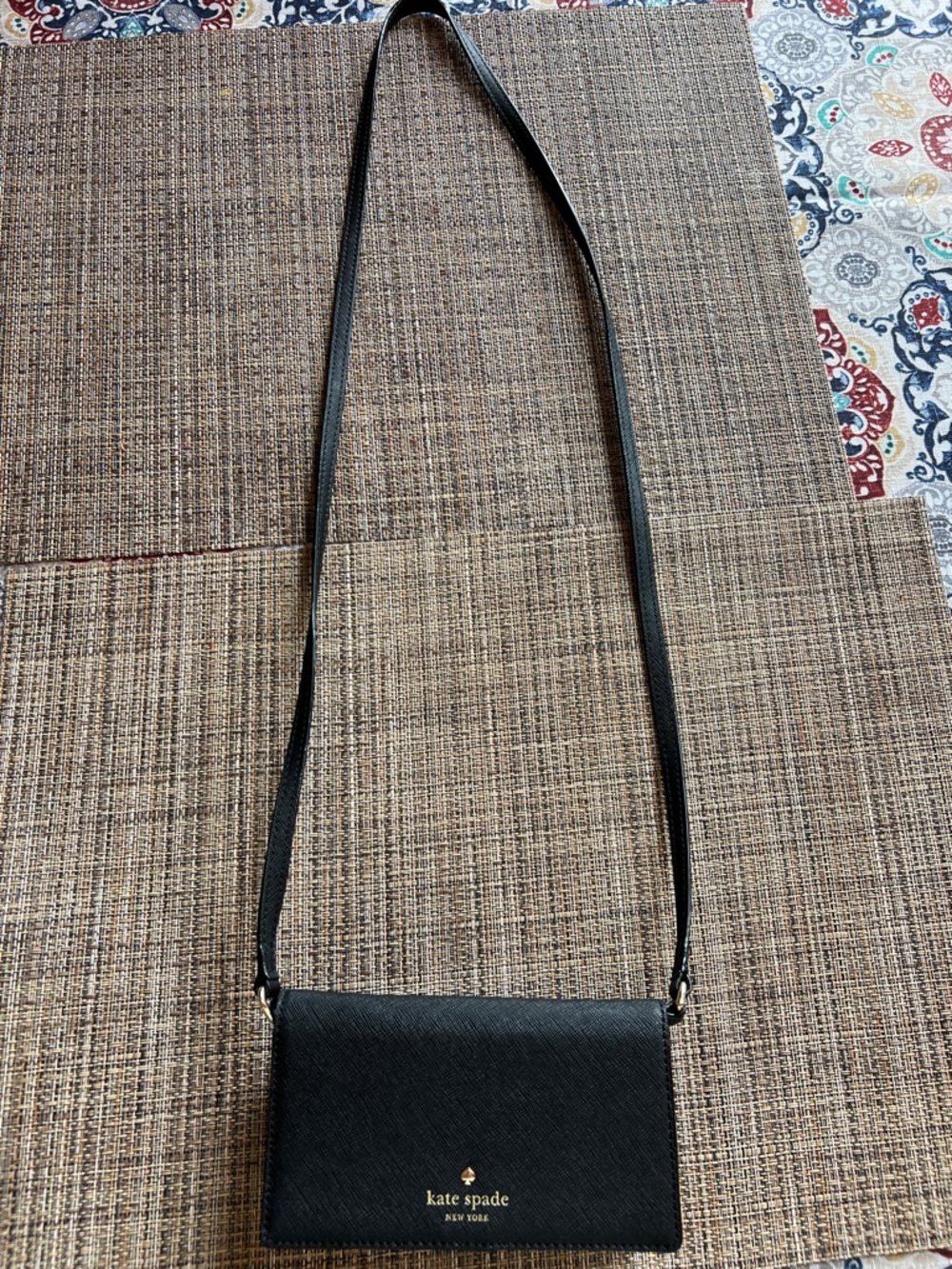 kate spade black leather crossbody wallet with gold logo
